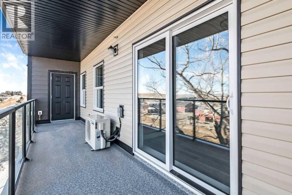 Laundry room - 201, 97 Station Drive, Sylvan Lake, AB T4S0S6 Photo 4