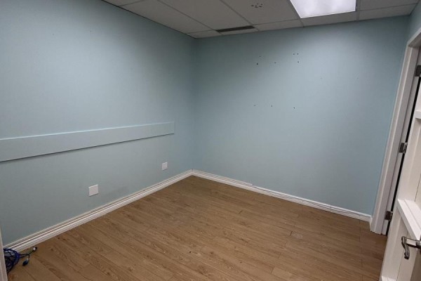 Office space with window, light blue walls, and laminate flooring - 201 - 10132 Yonge Street, Richmond Hill