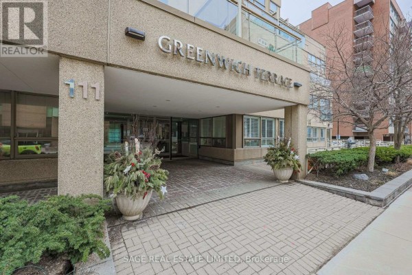 Entrance to Greenwich Terrace building at 111 Merton Street S, Toronto with brick paving. - 201 - 111 Merton Street S, Toronto
