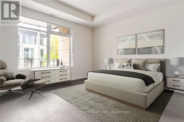 Rooftop terrace with seating areas, wooden structures, and landscaped greenery. - 201 - 123 Maurice Drive, Oakville