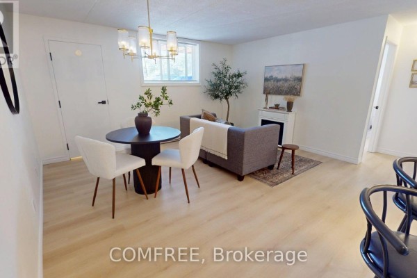 Living room - 201 - 50 Campbell Court, Stratford, ON N5A7T6 Photo 4