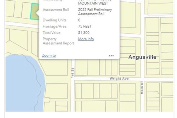 Aerial map of Angusville highlighting the property at 201 Railway Avenue next to a body of water. - 201 Railway Avenue, Angusville