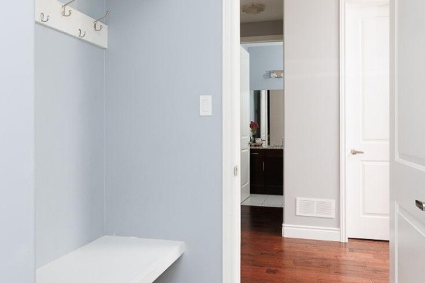 Hallway with bench, shelving, coat hooks, hardwood and tile floors - 2014 Ballymote Avenue London North