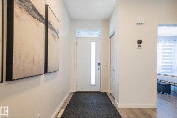 Family room - 2015 Desrochers Dr Sw, Edmonton, AB T6W4Y9 Photo 4