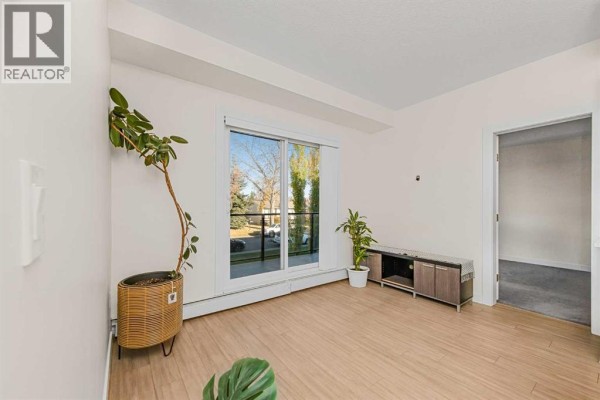Kitchen - 202, 15233 1 Street Se, Calgary, AB T2X0X5 Photo 4