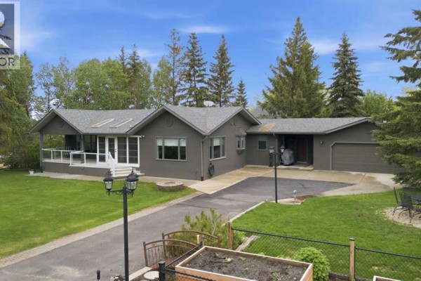 Sunroom - 202, 36214 Range Road 250, Rural Red Deer County, AB T0M1R0 Photo 2