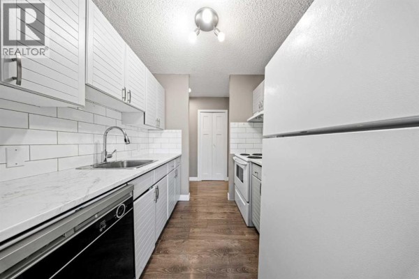 Primary Bedroom - 202, 718 12 Avenue Sw, Calgary, AB T2R0H7 Photo 5