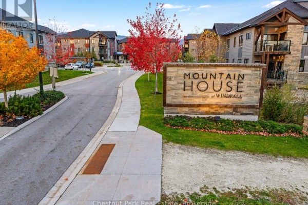 Entrance sign for Mountain House at Windfall with fall foliage. - 202 - 18 Beckwith Lane, Blue Mountains