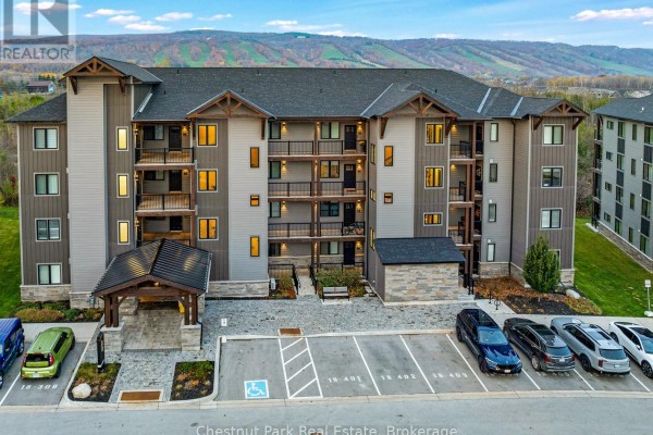 Exterior of a multi-story apartment building with balconies and parking lot. - 202 - 18 Beckwith Lane, Blue Mountains