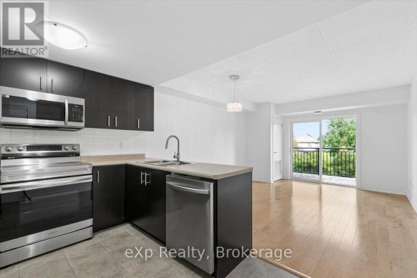 Laundry room - 202 - 41 Goodwin Drive, Guelph, ON N1L0E7 Photo 5