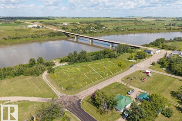 Aerial view of Duvernay village and surrounding landscape with river. - 202 River St, Duvernay