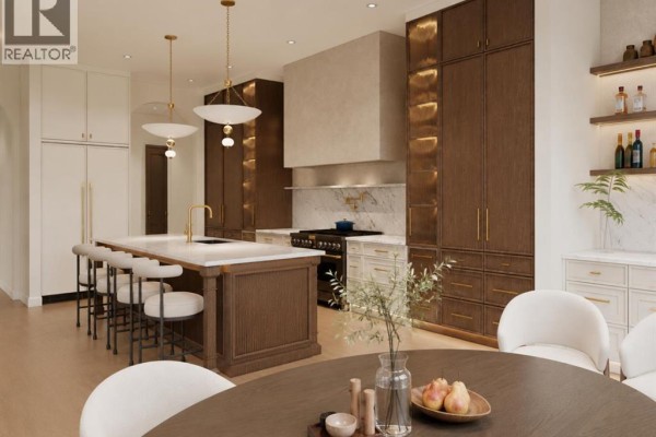 Modern kitchen with island, dark wood cabinets, and a dining area with chairs. - 2027 25 Street Sw, Calgary