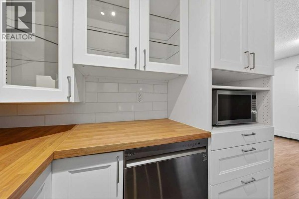 Living room - 202a, 5601 Dalton Drive Nw, Calgary, AB T3A2C3 Photo 5