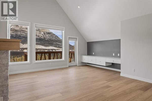 Bedroom - 202k, 209 Stewart Creek Rise, Canmore, AB T1W0N9 Photo 5