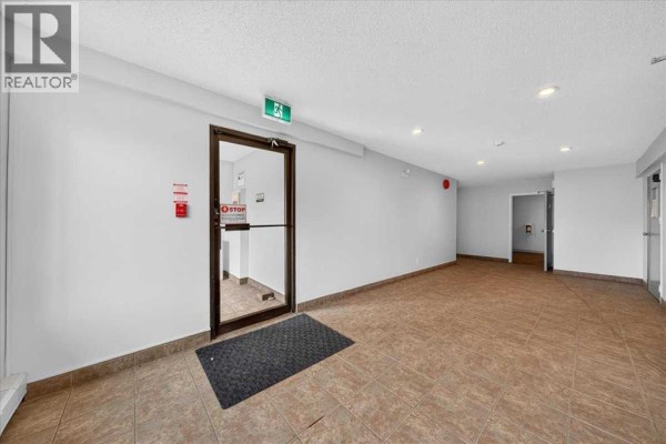Kitchen - 203, 1712 38 Street Se, Calgary, AB T2A1H1 Photo 3