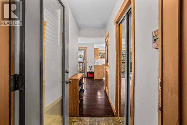 Bedroom - 203, 404 Marten Street, Banff, AB T1L1C6 Photo 5