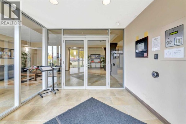 Living room - 203, 4102 69 Avenue, Lloydminster, AB T9V7K5 Photo 2