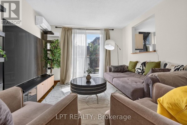 Living room - 203 - 50 Burnside Avenue, Ottawa, ON K1Y2M2 Photo 4