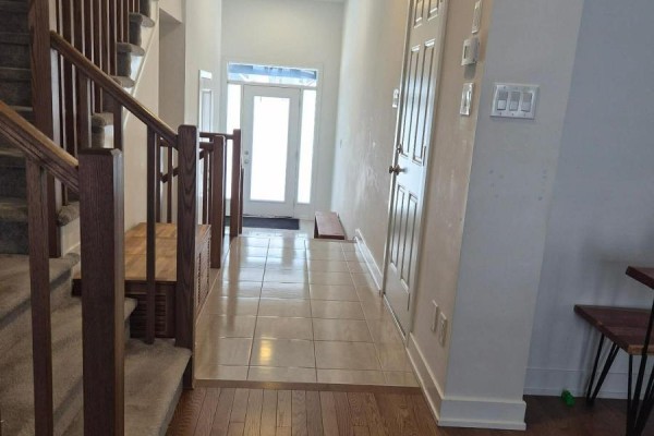 Bright entryway with tile flooring and double doors leading outside - 2037 Allegrini Terrace, Ottawa