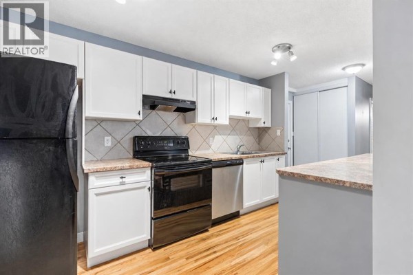 Primary Bedroom - 204, 112 23 Avenue Sw, Calgary, AB T2S0J1 Photo 3