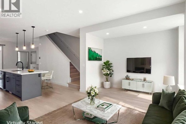 Living room - 204, 81 Greenbriar Place Nw, Calgary, AB T3B6J1 Photo 3