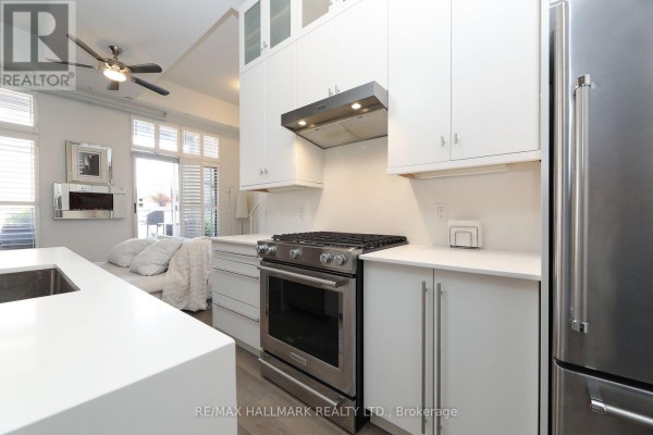 Primary Bedroom - 204 - 1842 Queen Street E, Toronto, ON M4L1H1 Photo 4