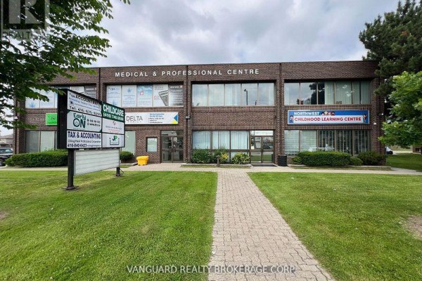 Front entrance of the medical and professional centre featuring multiple business signs. - 204 - 2978 Islington Avenue, Toronto