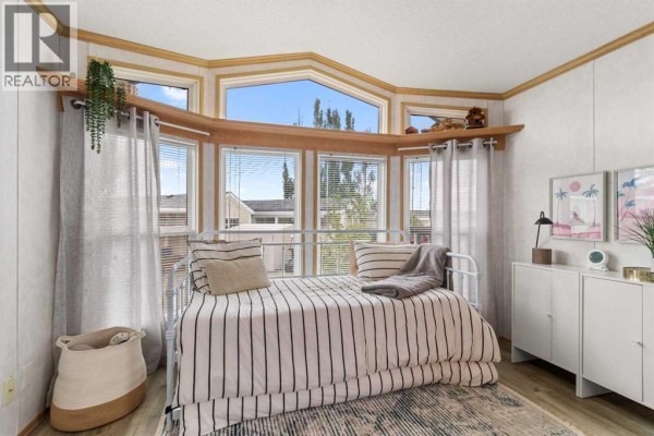 Bedroom - 2042, 25054 South Pine Lake Road, Rural Red Deer County, AB T0M1R0 Photo 4