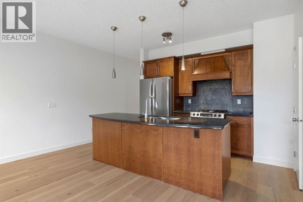 Bedroom - 205, 1818 14 Street Sw, Calgary, AB T2T0C3 Photo 3