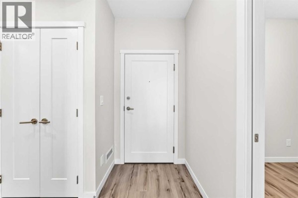 Laundry room - 205, 71 Shawnee Common Sw, Calgary, AB T2Y0R2 Photo 3