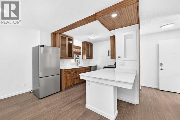 Bedroom - 205, 829 Coach Bluff Crescent Sw, Calgary, AB T3H1B1 Photo 5