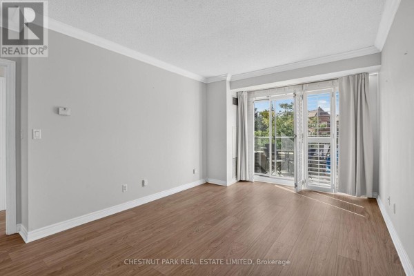Living room - 205 - 100 Promenade Circle, Vaughan, ON L4J7W7 Photo 2