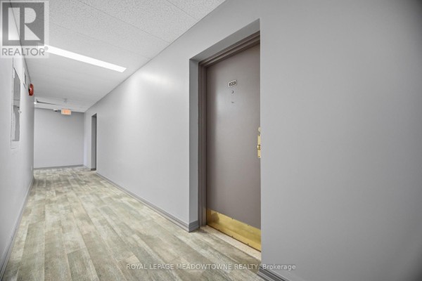 Primary Bedroom - 205 - 24 Ransom Street, Halton Hills, ON L7J1S3 Photo 4