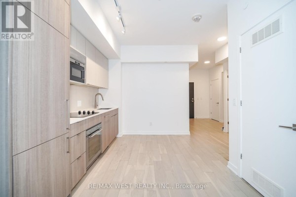 Bedroom - 205 - 840 St Clair Avenue W, Toronto, ON M6C0A4 Photo 4