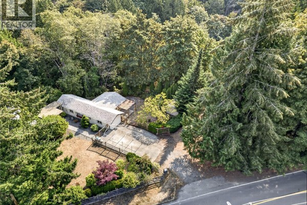 Aerial view of a property lot with a road and houses on the left. - 205 Atkins Rd, View Royal
