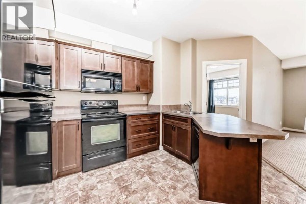 Primary Bedroom - 206, 69 Ironstone Drive, Red Deer, AB T4R0J8 Photo 5