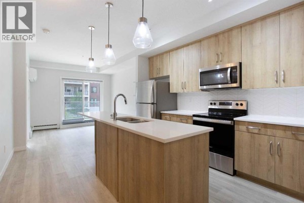 Laundry room - 206, 71 Shawnee Common Sw, Calgary, AB T2Y0R2 Photo 3
