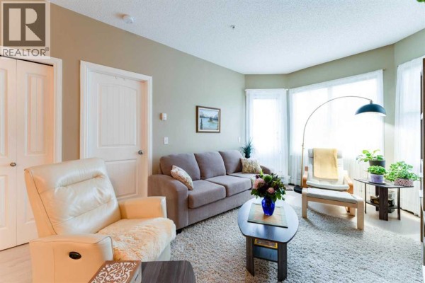 Living room - 206, 8 Prestwick Pond Terrace Se, Calgary, AB T2Z4P3 Photo 5