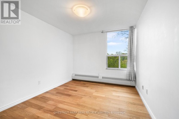 Bedroom 2 - 206 - 60 Pavane Linkway, Toronto, ON M3C1A1 Photo 5