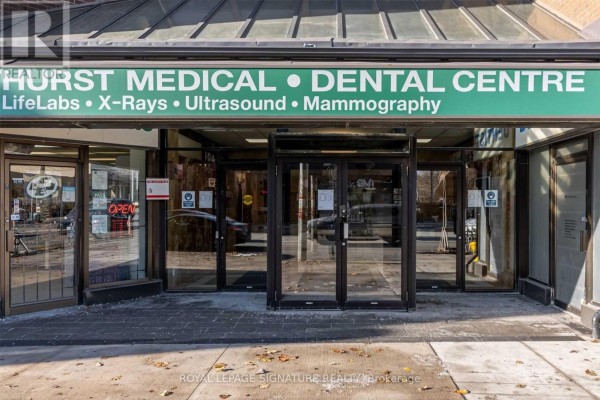 Entrance to Hurst Medical and Dental Centre with glass doors and green awning. - 206 - 800 Bathurst Street, Toronto