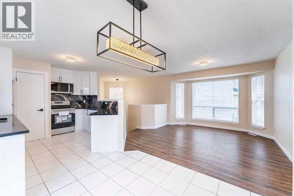 Kitchen - 206 Saratoga Close Ne, Calgary, AB T1Y7A1 Photo 5