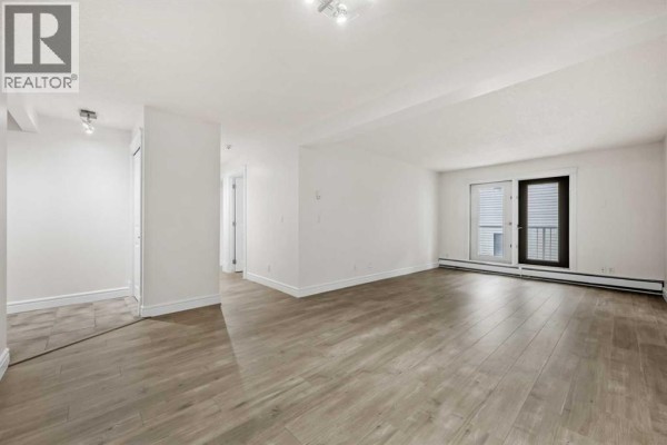 Kitchen - 207, 2010 35 Avenue Sw, Calgary, AB T2T2E1 Photo 3