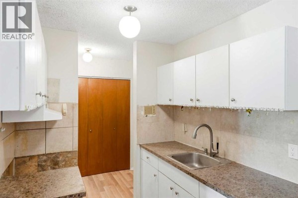 Living room - 207, 6464 Travois Crescent Nw, Calgary, AB T2K3S9 Photo 5