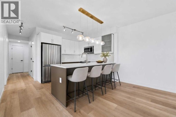 Laundry room - 207, 805 4 Street Ne, Calgary, AB T2E3S9 Photo 5