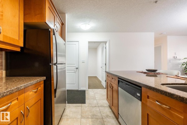 Kitchen - #207 400 Palisades Wy, Sherwood Park, AB T8H0H4 Photo 3