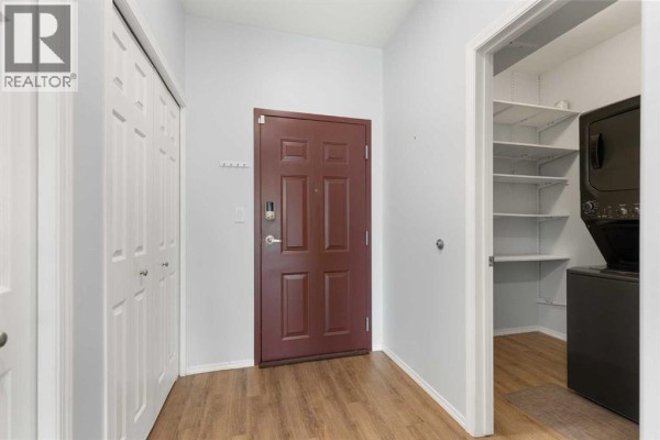 Living room - 208, 105 Main Street S, Redcliff, AB T0J2P0 Photo 3