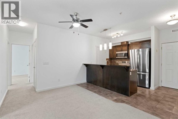 Bedroom - 208, 141 Mountain Street, Cochrane, AB T4C1Z5 Photo 4