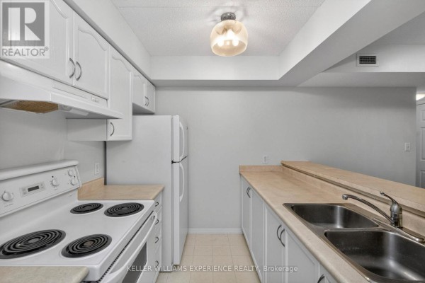 Kitchen - 208 - 107 Bond Street, Orillia, ON L3V1J7 Photo 4