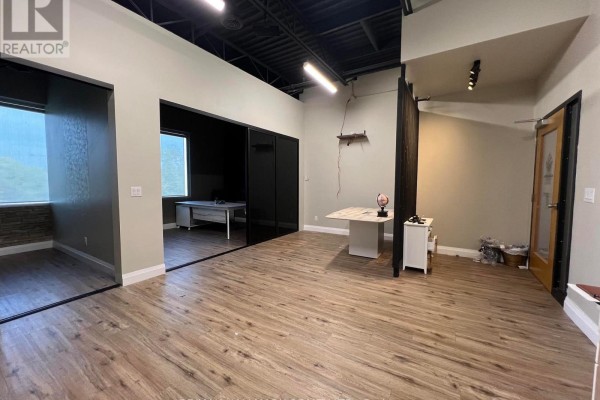 Floor plan for a commercial office space with dimensions and room labels. - 208 - 3485 Rebecca Street, Oakville