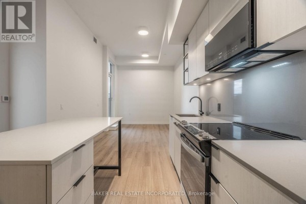 Primary Bedroom - 208 - 740 Dupont Street, Toronto, ON M6G0A9 Photo 4